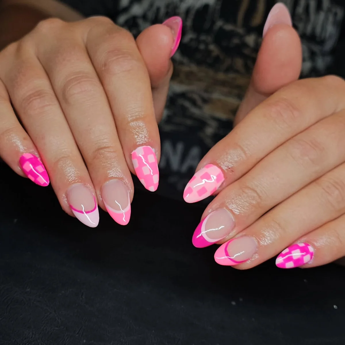 Pink almond nails with white floral details