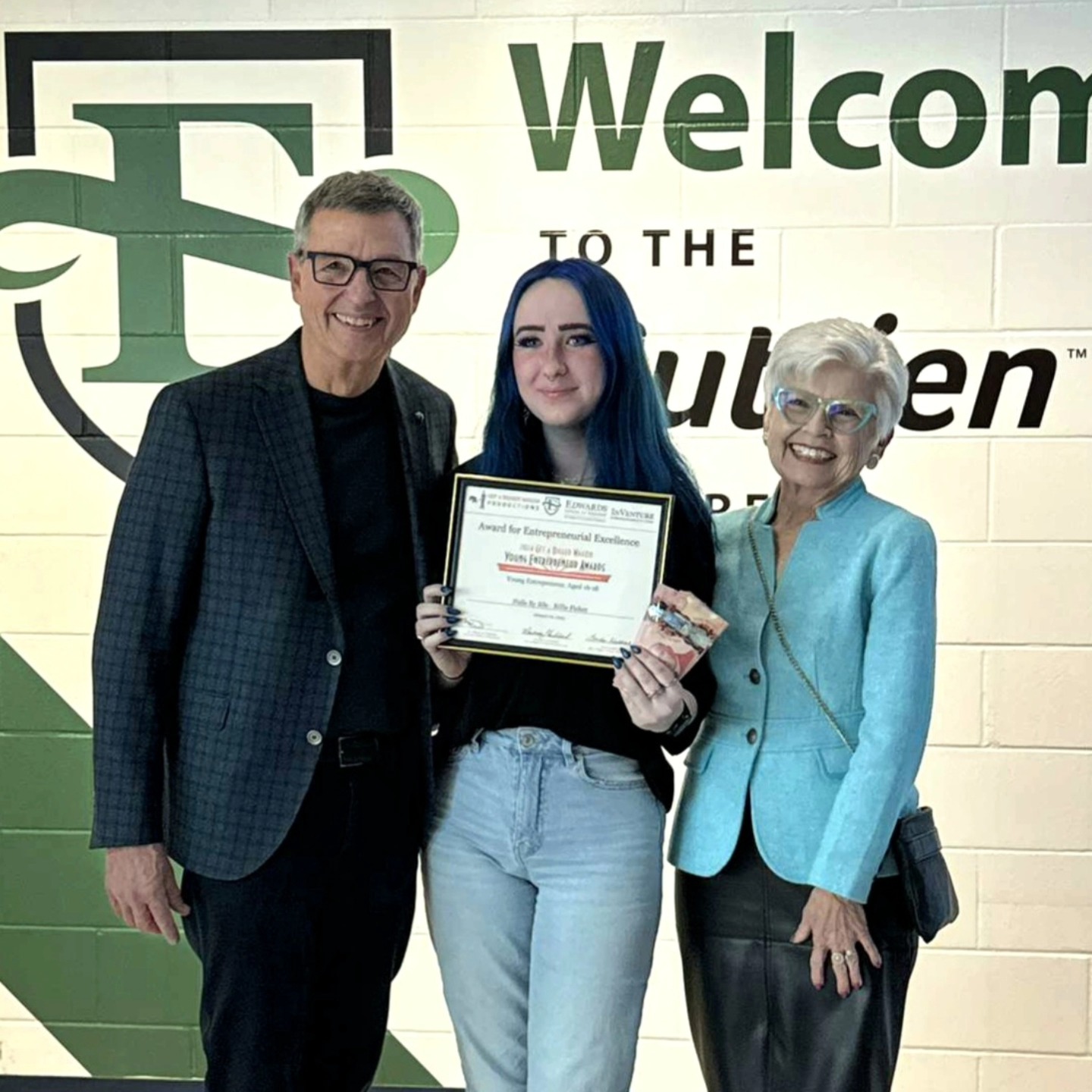 Billie receiving her certification